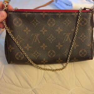 Authentic Louis Vuitton MonogramPallas Clutch
